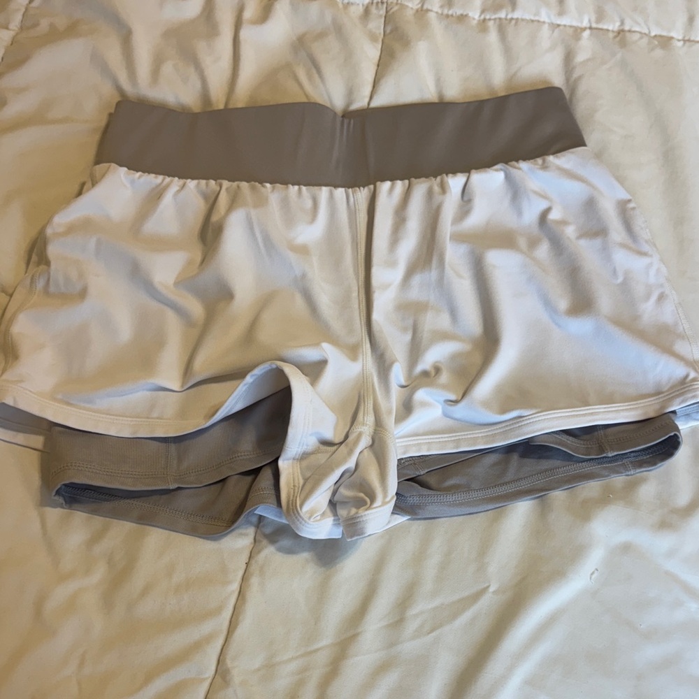 Fabletics Cream and Gray Athletic Shorts